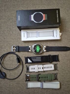Samsung Galaxy Watch Ultra with Black Strap and Multiple Bands